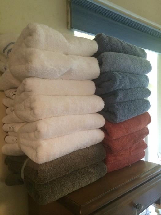 Many towels and other linens 