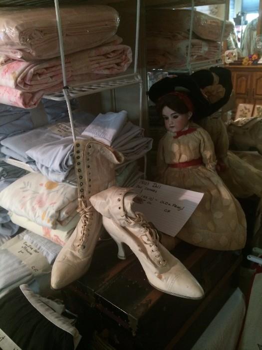 Vintage shoes; very old doll with trunk and clothes