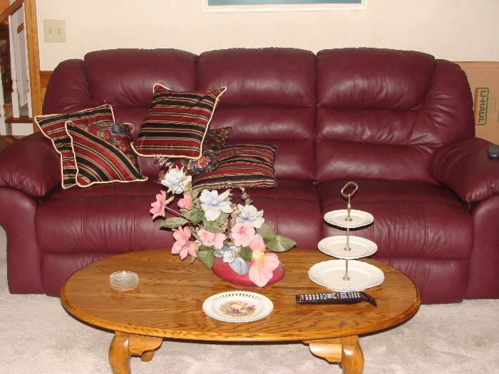 Leather Sofa in excellent condition! plus oval oak coffee table