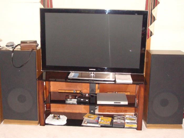 Samsung 50" Plasma TV ( 2009 ), series 8, model PN50B850YIF X2A also glass topped TV table and a complete sound system are for sale.