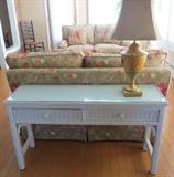 Glass top Henry Link Wicker table and decorative lamp