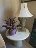Urn lamp and contemporary table and floral arrangement
