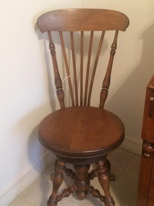 Antique piano stool with back