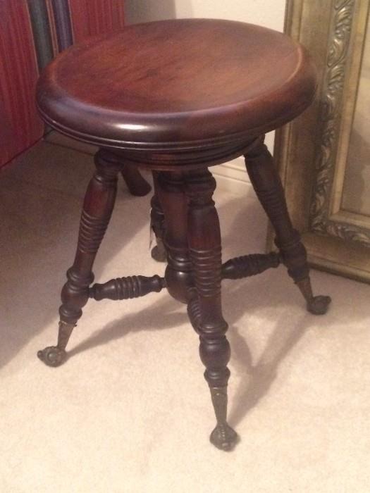 Antique piano stool without back