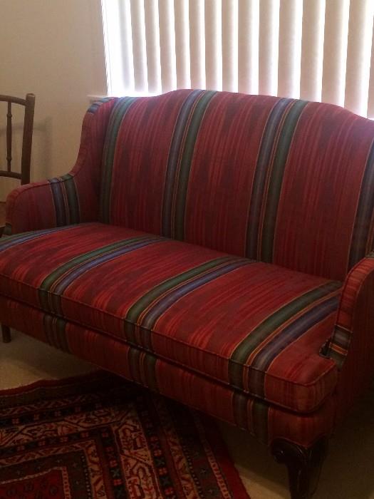 Good-looking brightly colored upholstered settee