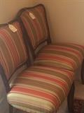 Two of six antique dining chairs  