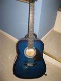 Johnson guitar with stand