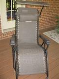 Pair of covered lounge chairs