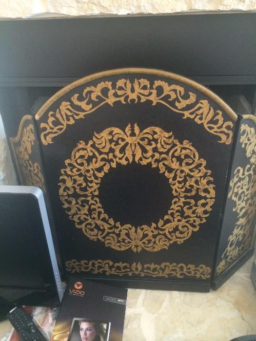 Black and gold fire screen