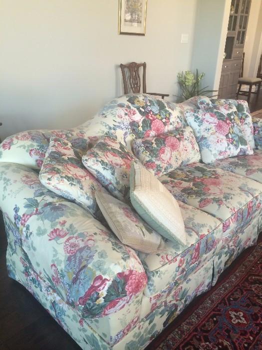 3-cushioned floral sofa