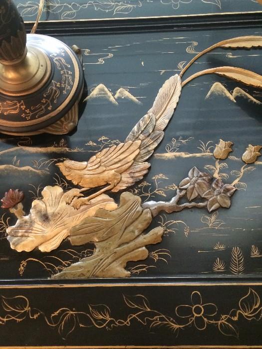 Black lacquered Asian chest with stunning carvings