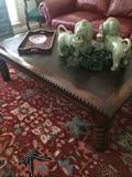Impressive coffee table; pair of celadon lions