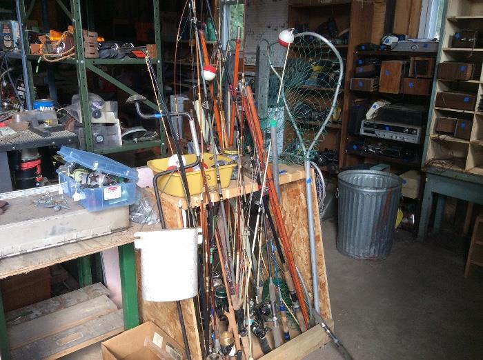 Lots of fishing rods and lures and reels