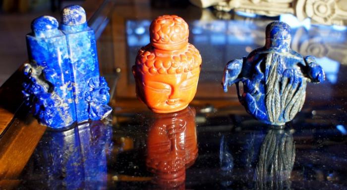 Coral Buddha Snuff Bottle, Two Carved Lapis Snuff Bottles