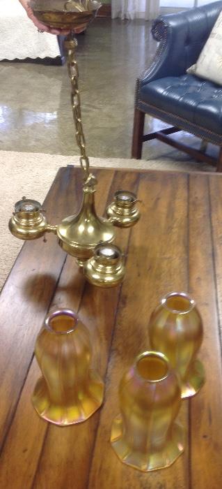 Quzell Chandelier with three beautiul vintage gold iridescent globes. 