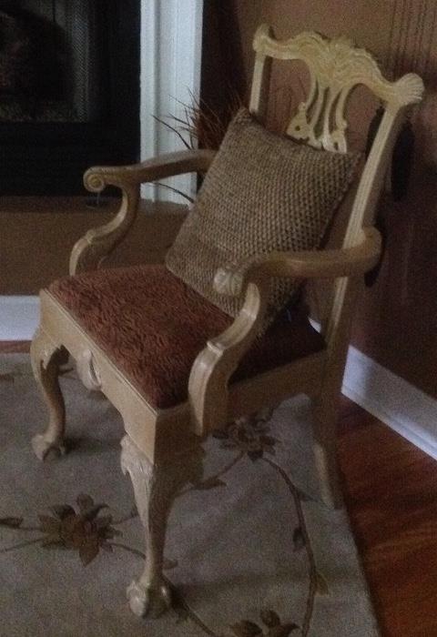 Elegant and comfortable.  Solid wood harp chair.  We have two of these in the master suite.