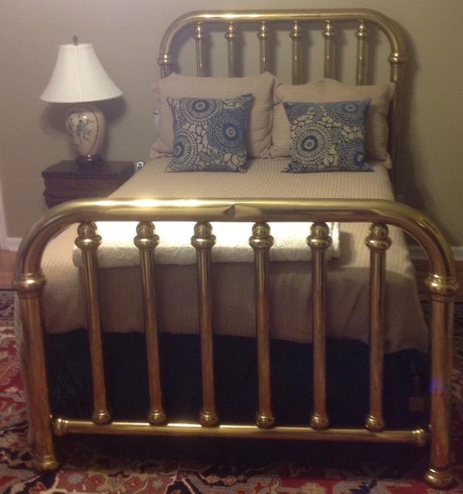Twin Brass half or twin bed. 