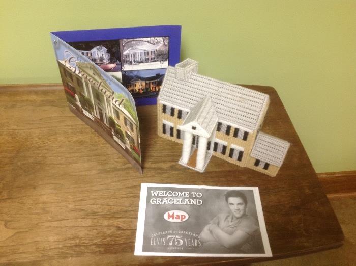 Small replica of Elvis's home "Graceland" in Memphis, TN with brochure and flyer.