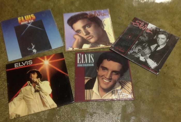 Another grouping of Elvis albums and calendars.