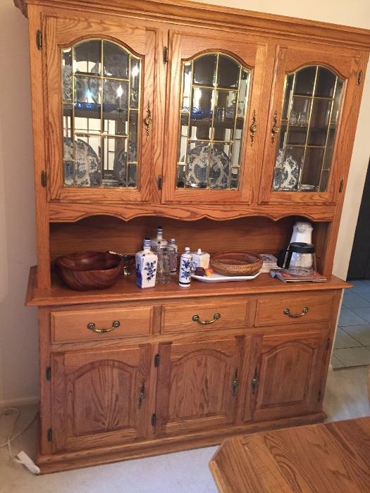OK China cabinet and matches dining room table with eight chairs sold separately