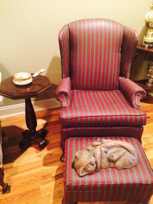 Wing chair and ottoman, faux kitty asleep; octagonal antique side table