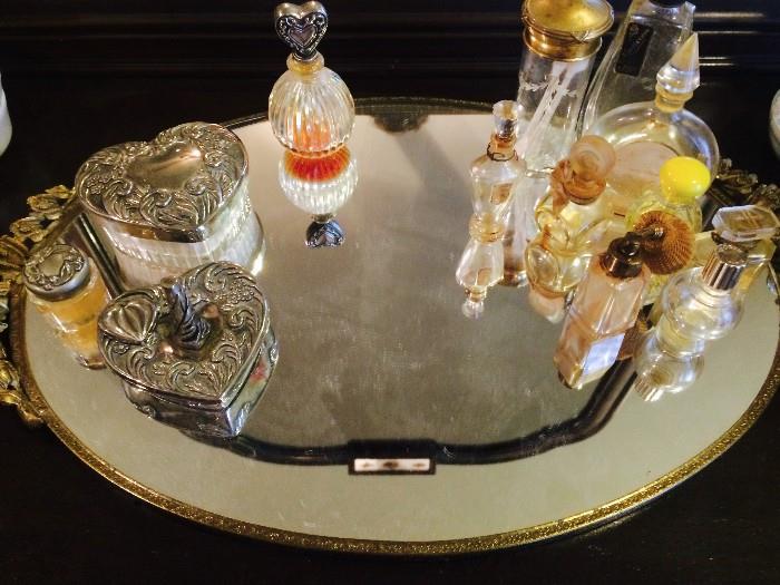 Antique vanity tray with perfume bottles and pewter heart set