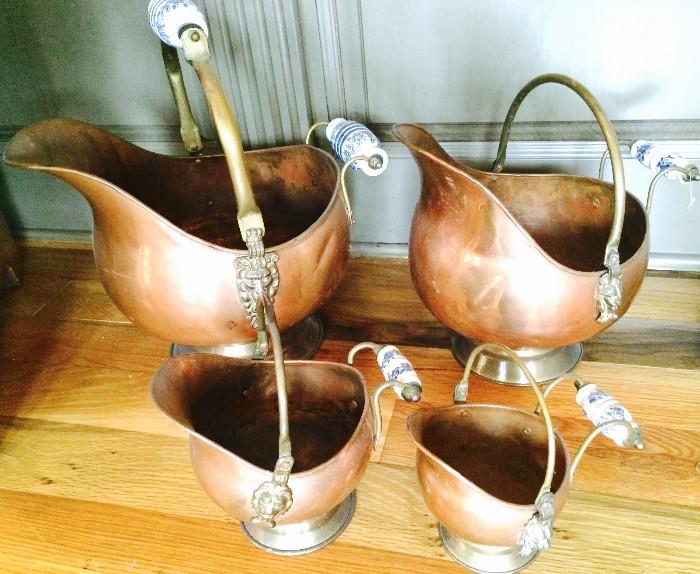 Graduated set of copper/brass scuttles with porcelain handles