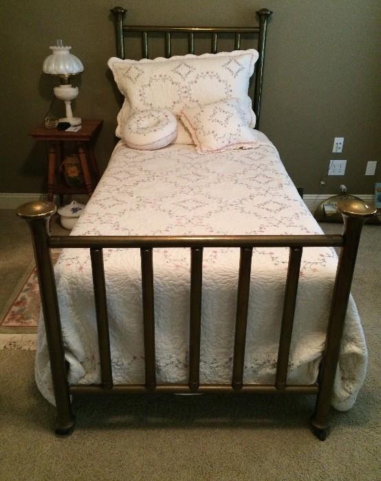 Antique brass twin bed 