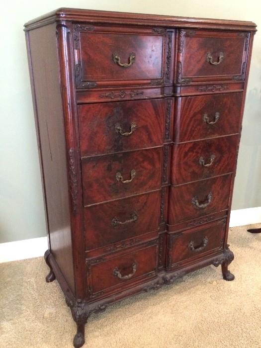 Striking antique dresser with carved detail