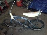 Schwinn Stingray, with high bars and banana seat