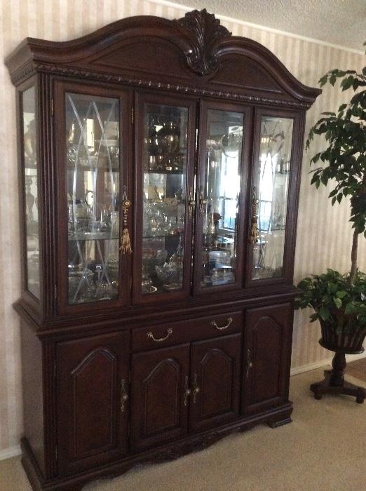 Nice glass front cabinet. Perfect for China, glass, collectables or in the library for books. Nice beveled glass. 