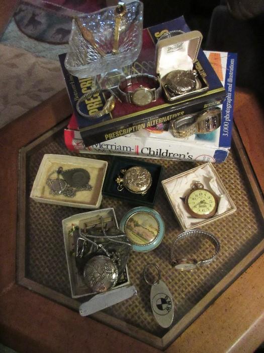 Antique pocket watch, watches, belt buckles, ladies watches, men's watches.