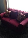 Red Love Seat with matching sofa.