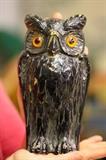 carved and painted wooden owl figure from turn of the century
