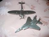 Airplanes, assorted pewter planes by Danbury mint., F-1s, Spitfire,707, P-40, ME-109,  Zero, P-38, Concorde, Hurricane, Piper Cub, FW-190, Polikarpov 1-16
