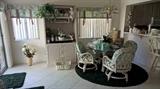 Rattan and glass dinette
