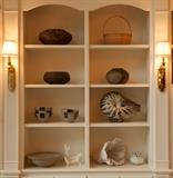 decorative baskets, ocean coral, ceramic nautilus (by Patrick Johnson), wood fire glazed pots and assorted ceramic pieces
