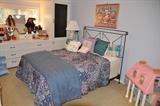 Adorable Girls Bedroom with Full Size Iron Headboard and Mattress Set