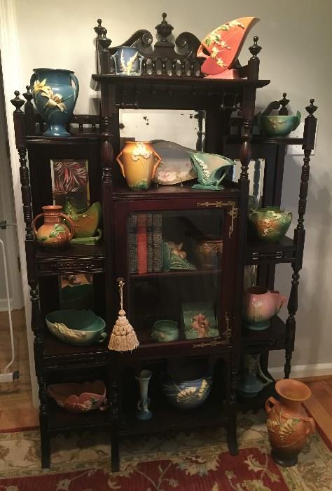 East Lake Victorian Display Cabinet filled with Roseville Pottery