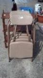 set of four fold-up chairs