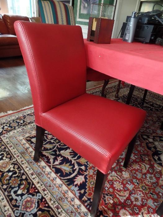 Set of 4 red leather dining chairs
