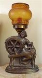 Handsome Figural (Woman with Spinning Wheel) Torch Lamp