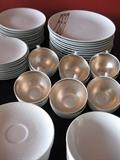 Made to order china with etched sterling silver on plates and cups lined in sterling silver