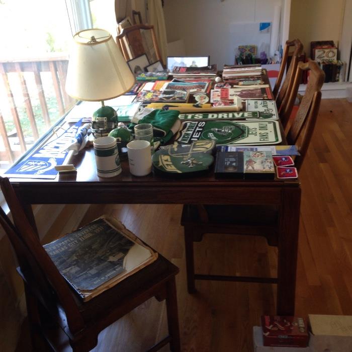 Sports collectibles, dining table and chairs