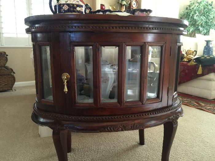 Oval sofa end table/cabinet  (opens front and back)