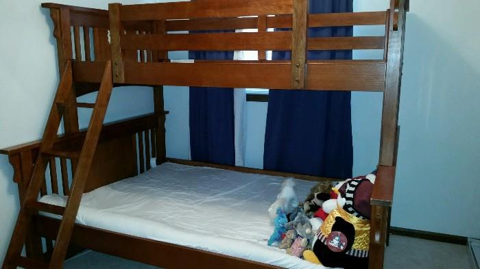 Bunk Bed Frame. Single on Top and Twin on Bottom.
