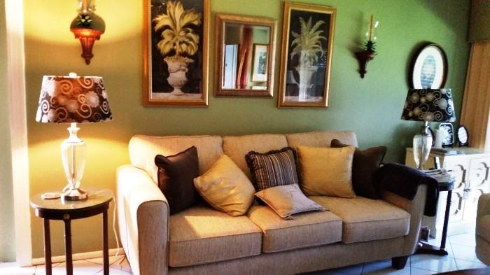 BEAUTIFUL LINEN COUCH, WOOD SIDE TABLES, LOVELY MATCHING LAMPS WITH MODERN SHADES, TROPICAL FLORIDA STYLE FRAMED ART,  BEVELED WALL MIRROR