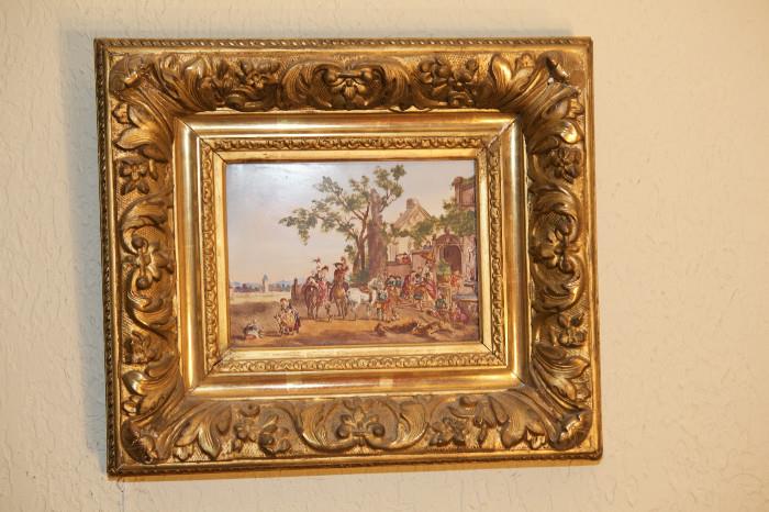 268/239  Painting.  An Italian 19th century painting on tile displaying mounted figures and pedestrians and animals in front of a rural church.
7 1/2" x 5 1/2", framed in giltwood and gesso.  $1075.00
