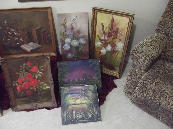 Collection of framed paintings, most by artist Pauline Smith .