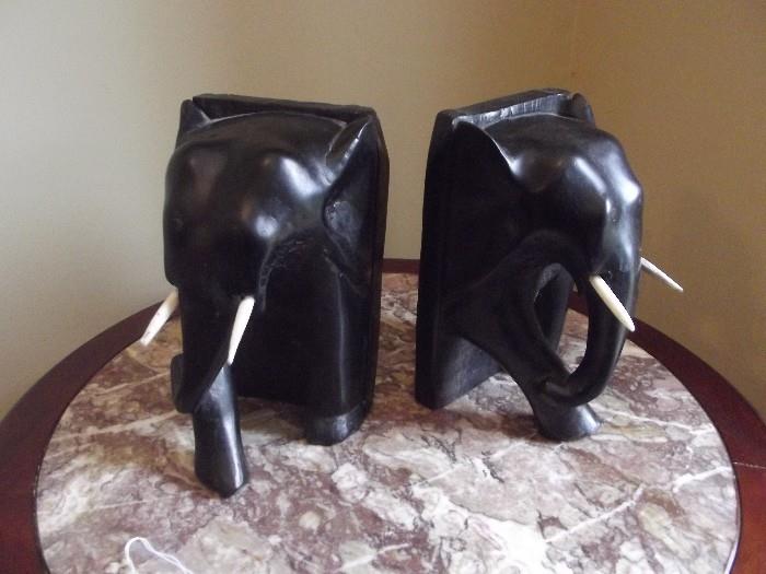Ebony/Iron wood Elephant bookend sculptures, with bone tusks. 